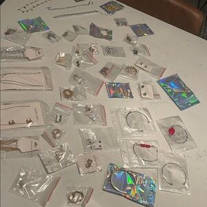 44 pieces of Jewelry. New. Necklace bracelet earrings